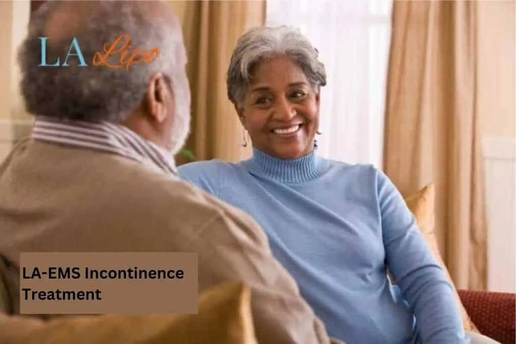 Couple sat smiling at each other - LA-EMS treatment Falkirk